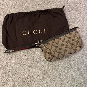 Gucci Classic GG Wristlet with inside slot/pocket and dust bag, Brown